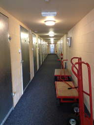Aberystwyth storage units corridor. Each door is a secure self storage Aberystwyth